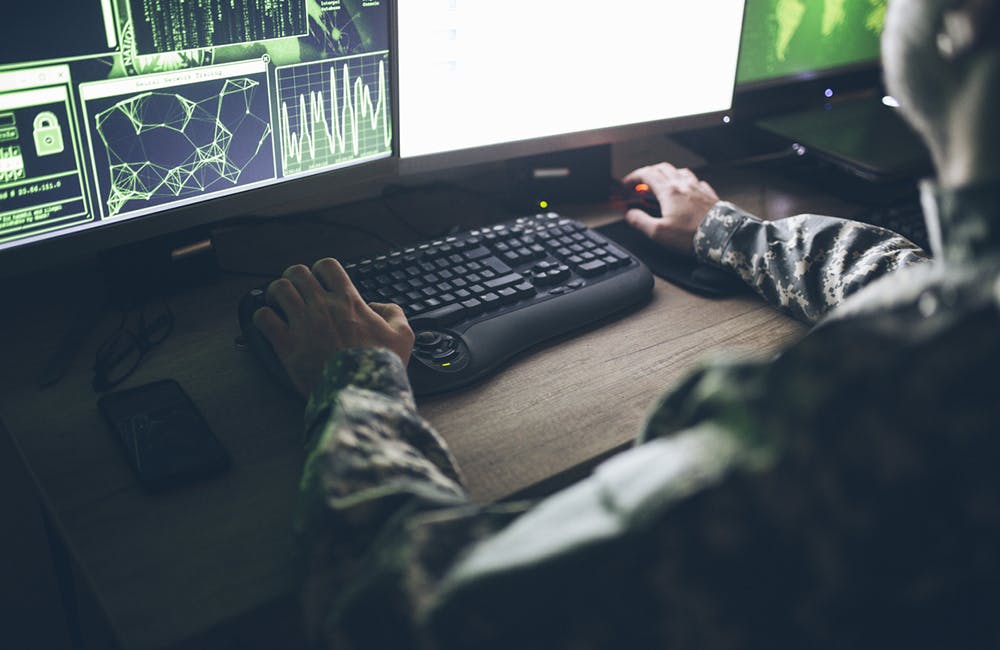 American soldier in headquarter control center