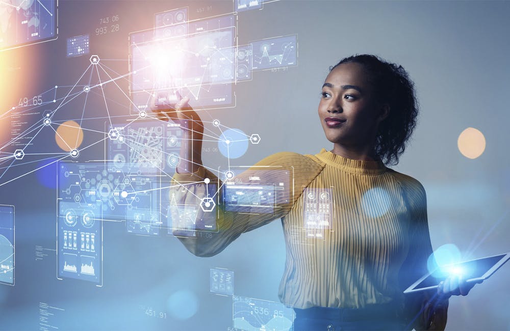 woman uses floating touch screen with technical information