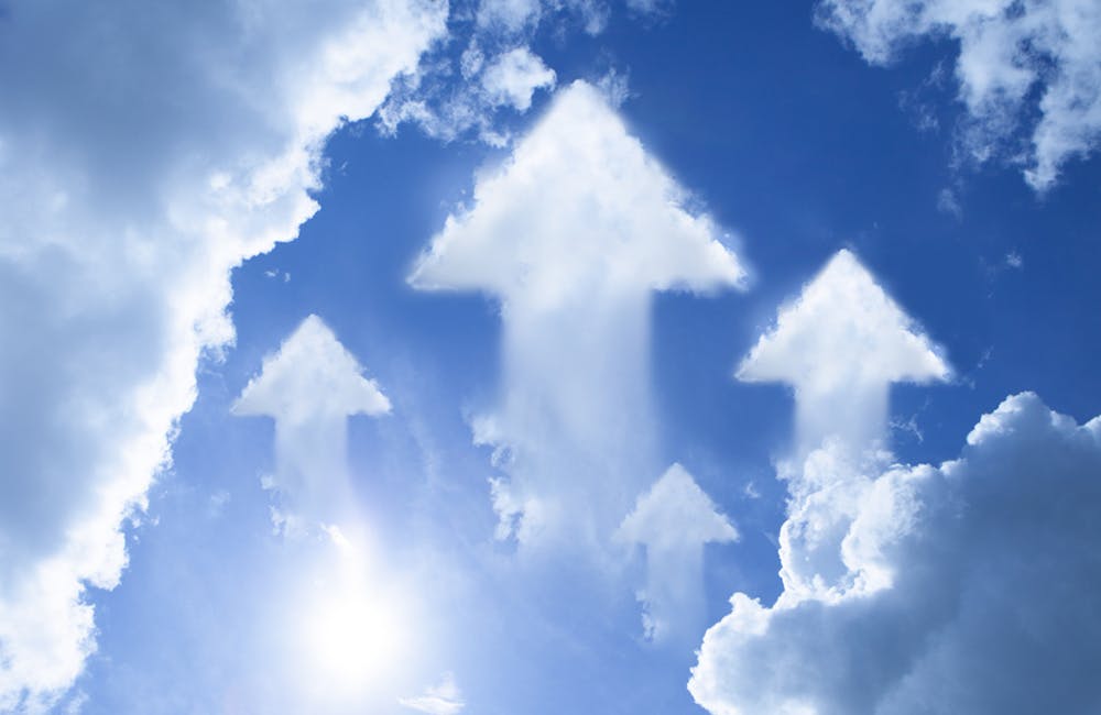 image of Arrow cloud shape on blue sky representing how cloud leaders at VA, NOAA and USCIS discuss the role of cloud in their strategies.