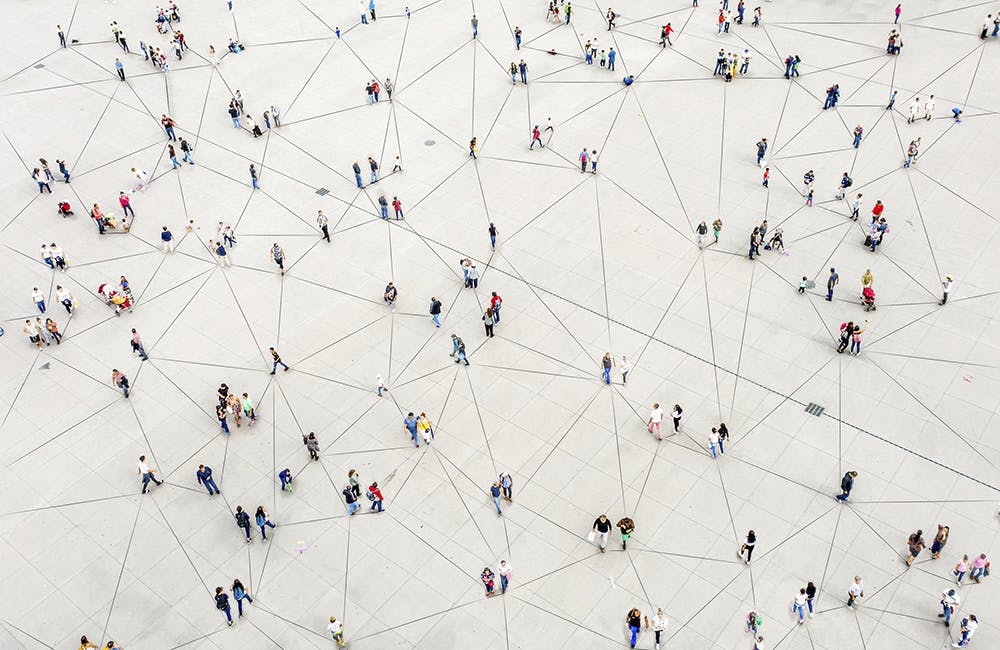 Aerial view of crowd connected by lines