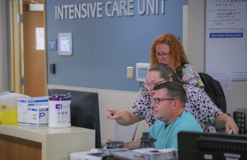 Teams of service members and civilians are helping the Blanchfield Army Community Hospital staff to implement MHS Genesis, June 7, 2023.