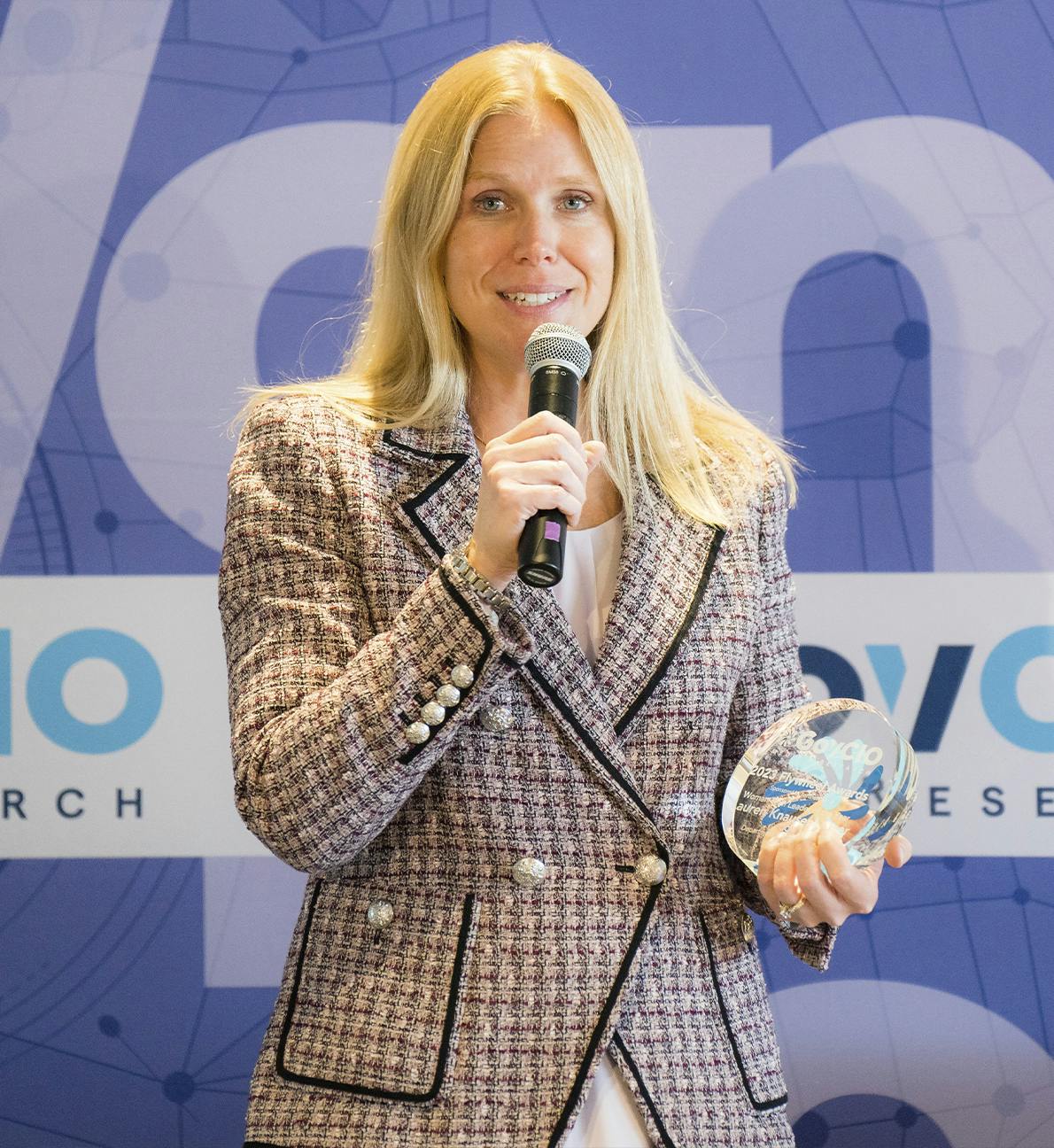 Lauren Knausenberger speaking with microphone