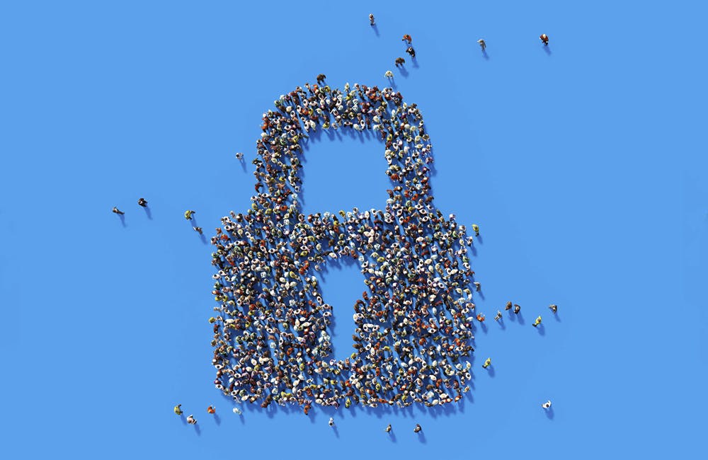 Human crowd forming a big lock symbol on blue background.