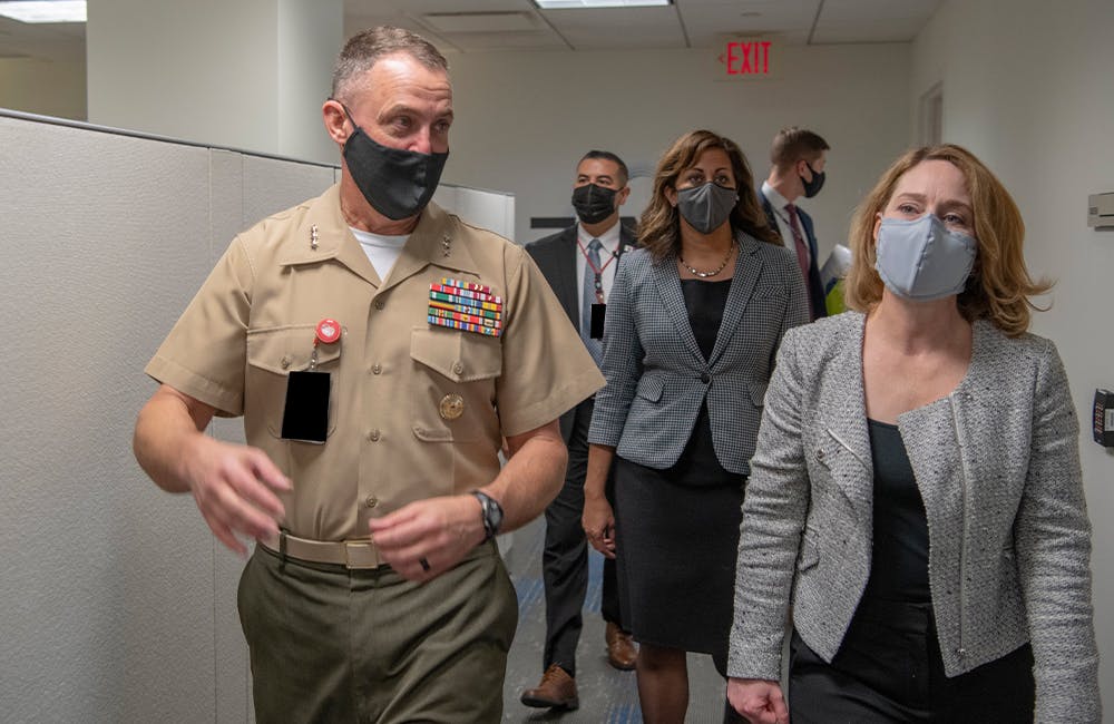 Deputy Secretary of Defense Kathleen Hicks walks with Marine Lt. Gen. Michael Groen, Commander of the Joint Artificial Intelligence Center during a tour of the JAIC, Arlington, Va., Oct. 29, 2021.
