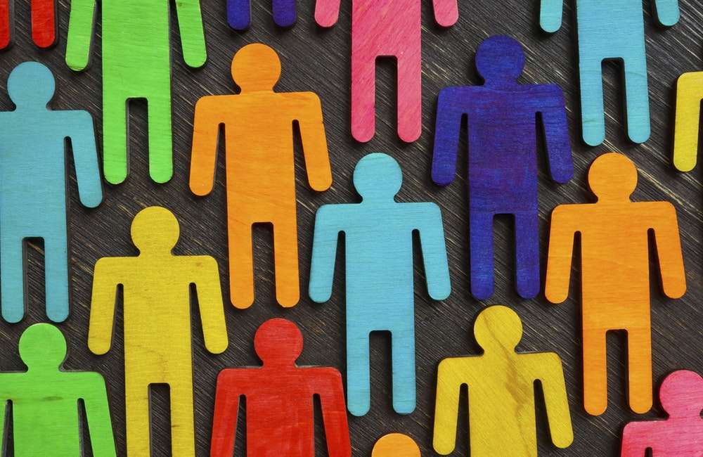 Figures with different colors as symbol of inclusion and diversity.