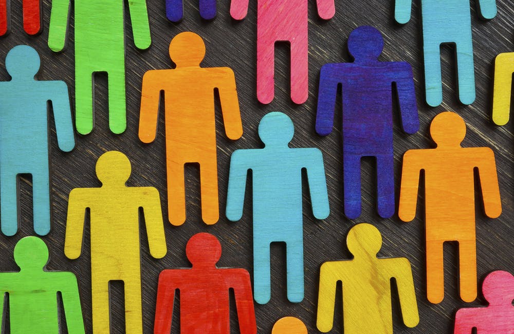 Figures with different colors as symbol of inclusion and diversity.