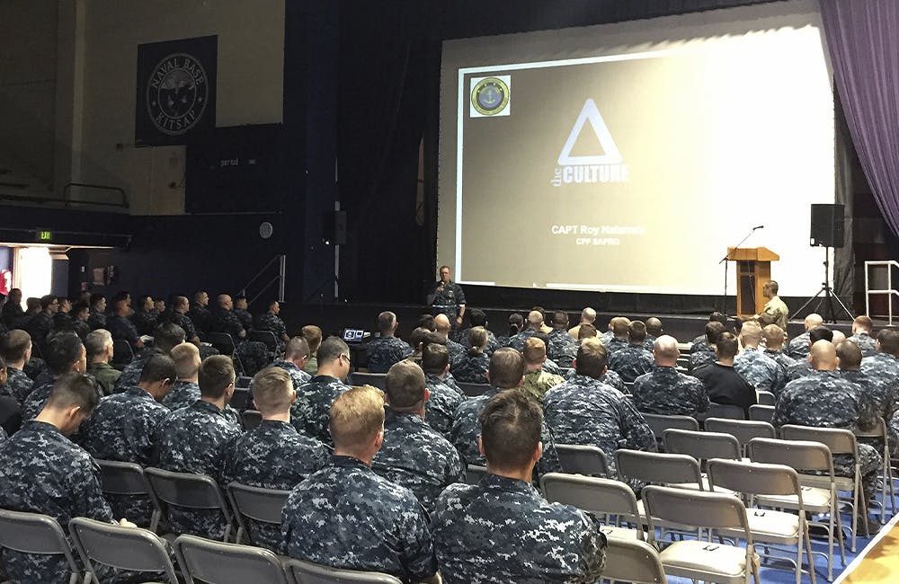 Navy recruiting top tech talent in auditorium