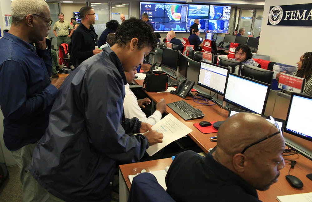 people working at the National Response Coordination Center at Federal Emergency Management Agency
