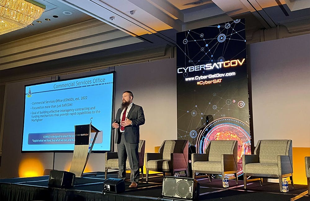 Space Systems Command Commercial Solutions Office Branch Chief Jared Reece speaks at CyberSatGov in Reston, Virginia, Nov. 2, 2022.