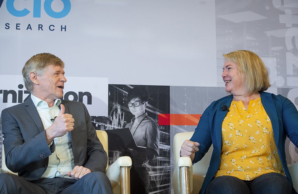image of Denodo SVP Data Architecture and Chief Evangelist Paul Moxon and Army People Analytics Deputy Director Lt. Col. Kristin Saling speaking at GovCIO Media & Research’s Cloud Modernization event on May 19, 2022