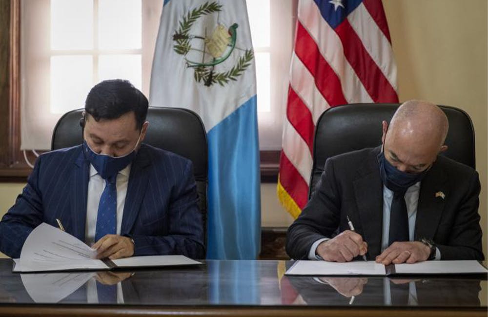 Secretary Mayorkas signs the Biometric Data Sharing Partnership Letter of Intent with Minister of Government Reyes.