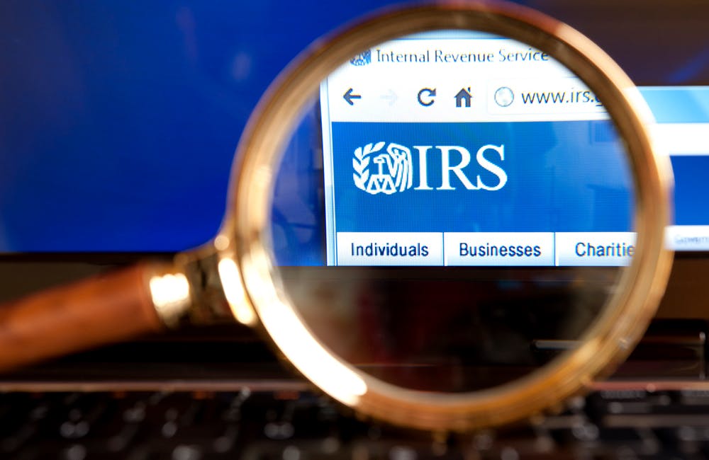 magnifying glass over IRS web page