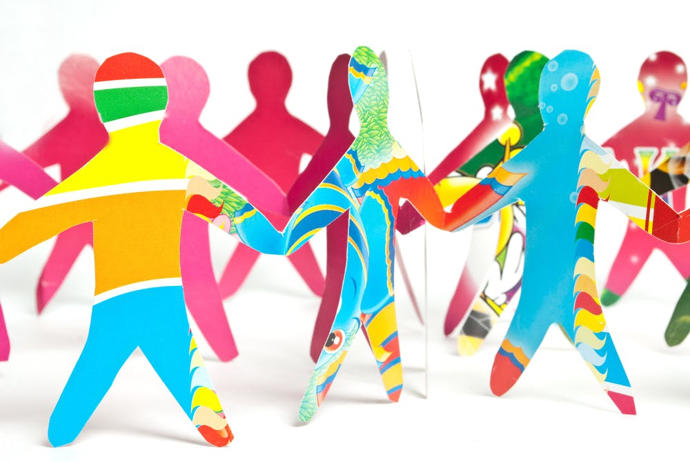 image of paper team cutouts