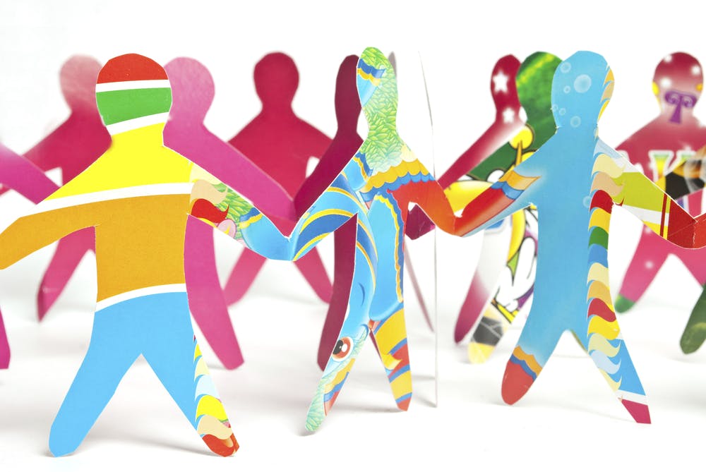 image of paper team cutouts