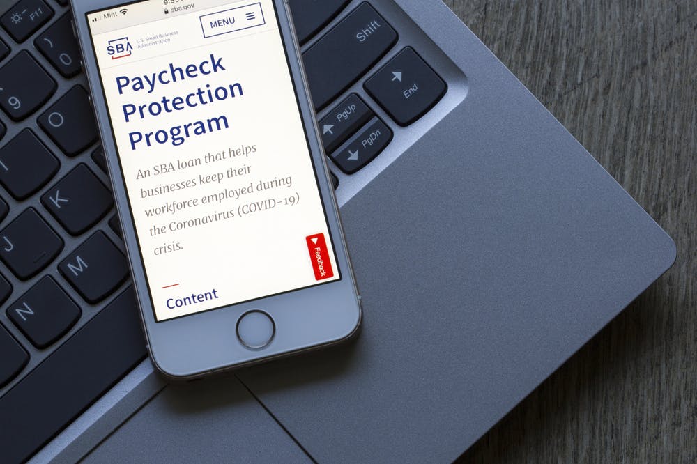 The U.S. Small Business Administration website's Paycheck Protection Program (PPP) page is seen on a phone.