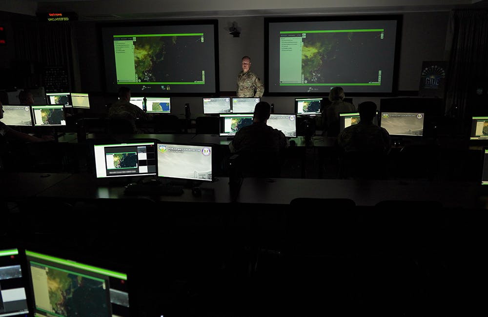 image of U.S. and Canadian service members participating in the third series of Global Information Dominance Experiments