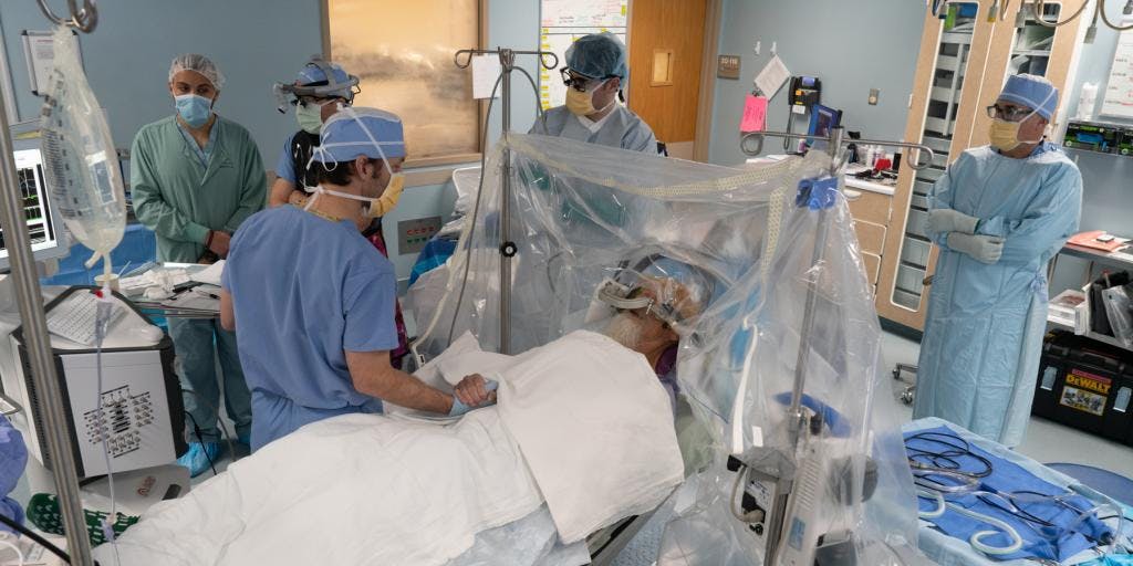 image of A neurosurgical team at the Minneapolis VA Health Care System performs a deep brain stimulator (DBS) implantation surgery in November 2021.