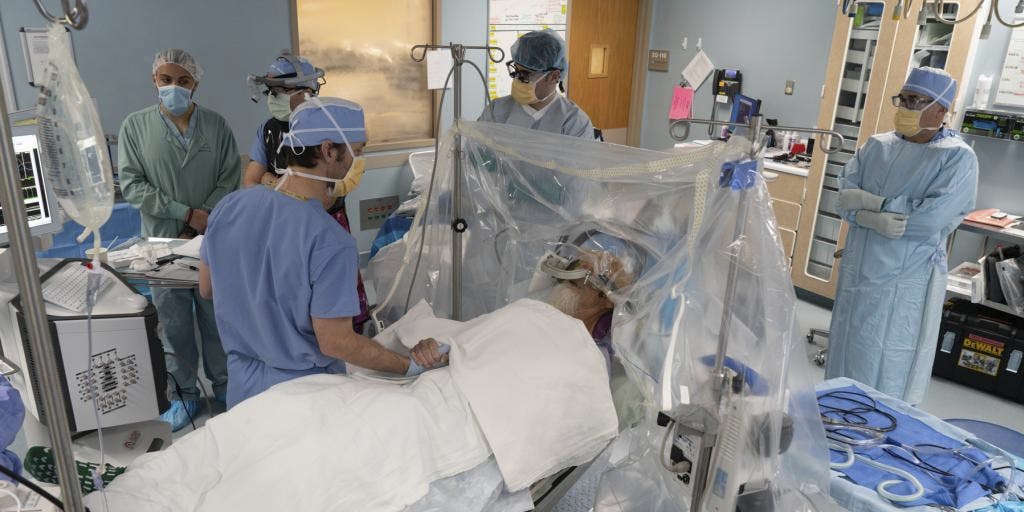 image of A neurosurgical team at the Minneapolis VA Health Care System performs a deep brain stimulator (DBS) implantation surgery in November 2021.