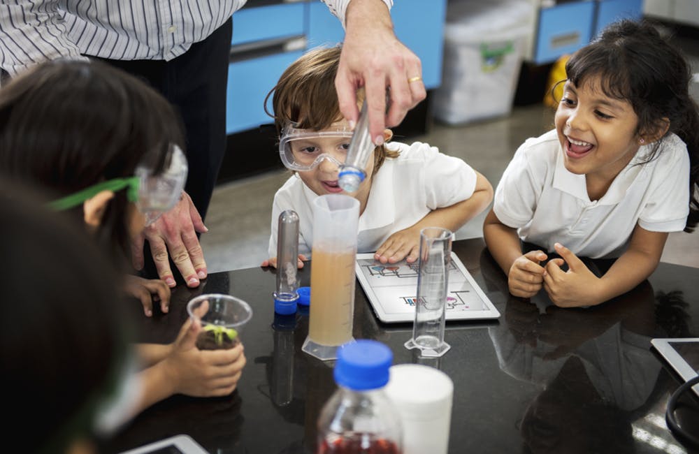 image of group of kindergarten students learning science class.