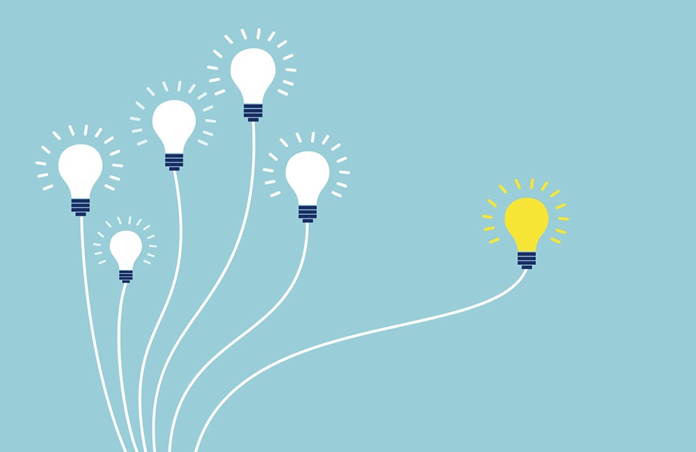 Vector of light bulbs on blue background. Business teamwork and one different opinion vision creative concept.