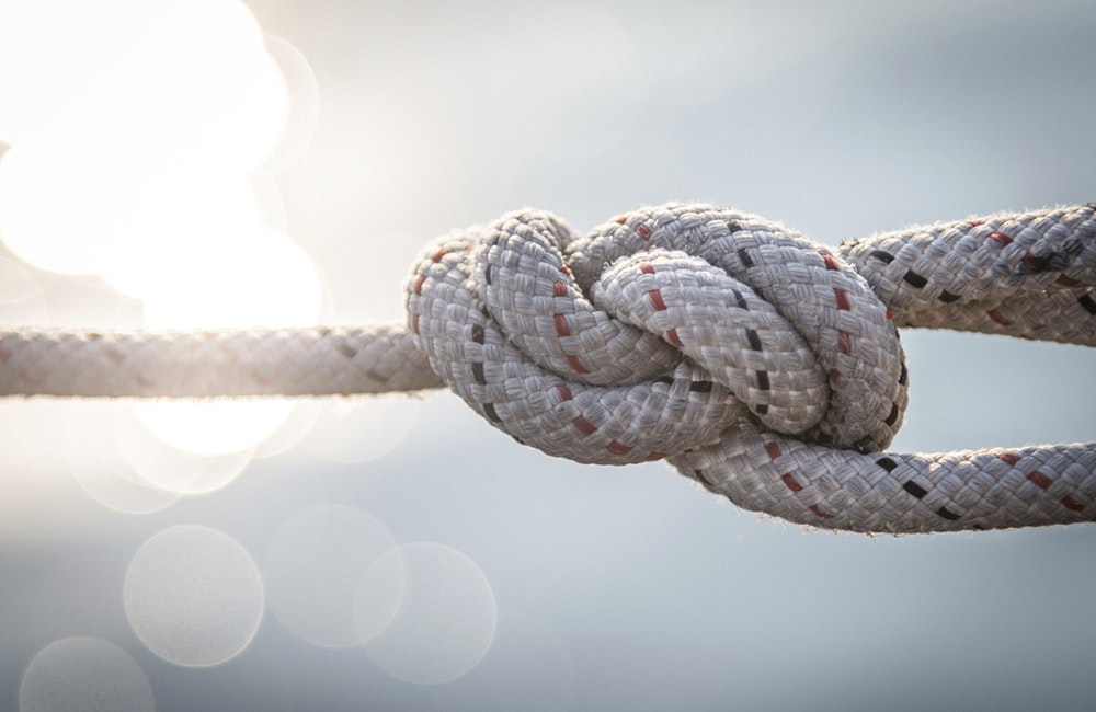 Sailor knot and rope in front of beautiful background