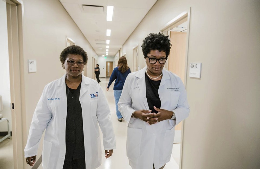 healthcare workers walking in hospital