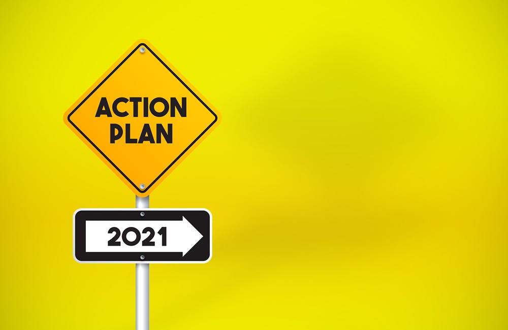 Action Plan 2021 Directional Road Sign On Yellow Background. Horizontal composition with copy space.