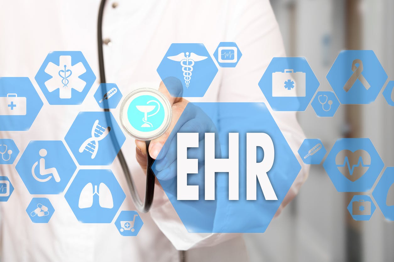 Electronic health record. EHR on the touch screen with medicine icons on the background blur Doctor in hospital.Innovation treatment, service, data analysis health. Medical Healthcare Concept Electronic health record, EHR