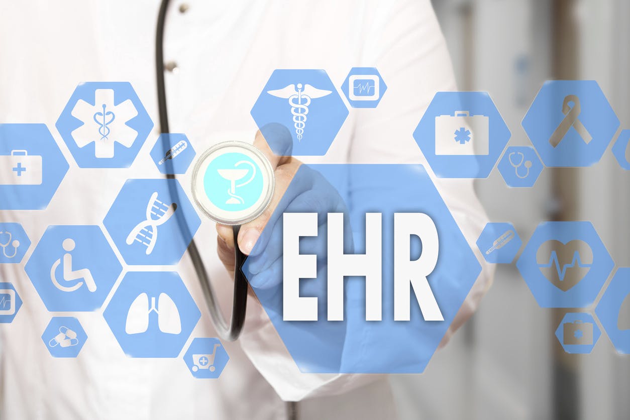 Electronic health record. EHR on the touch screen with medicine icons on the background blur Doctor in hospital.Innovation treatment, service, data analysis health. Medical Healthcare Concept Electronic health record, EHR