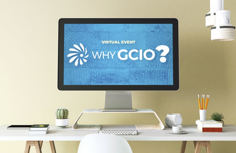 A computer screen in a home office with the words Why GCIO?