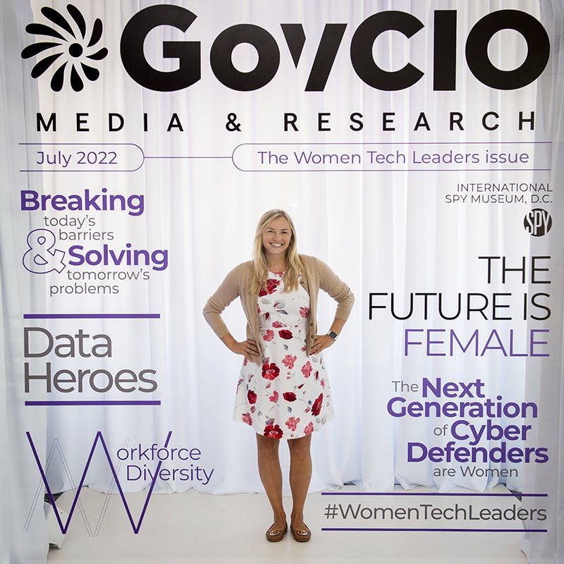 Attendees pose with our Women Tech Leaders magazine cover.
