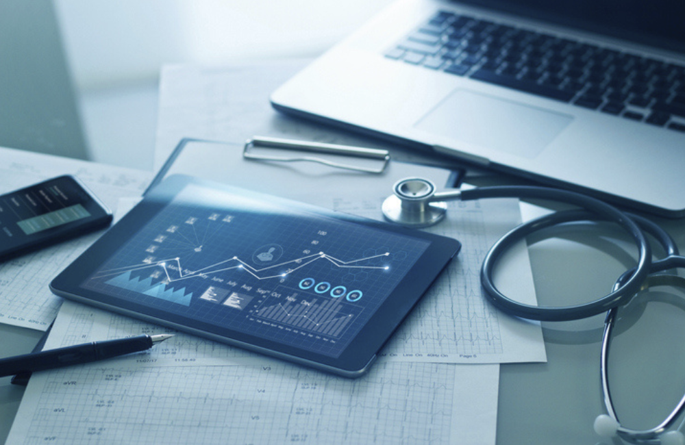 Healthcare business concept, Medical examination and growth graph data of business on tablet with doctor's health report clipboard on background.