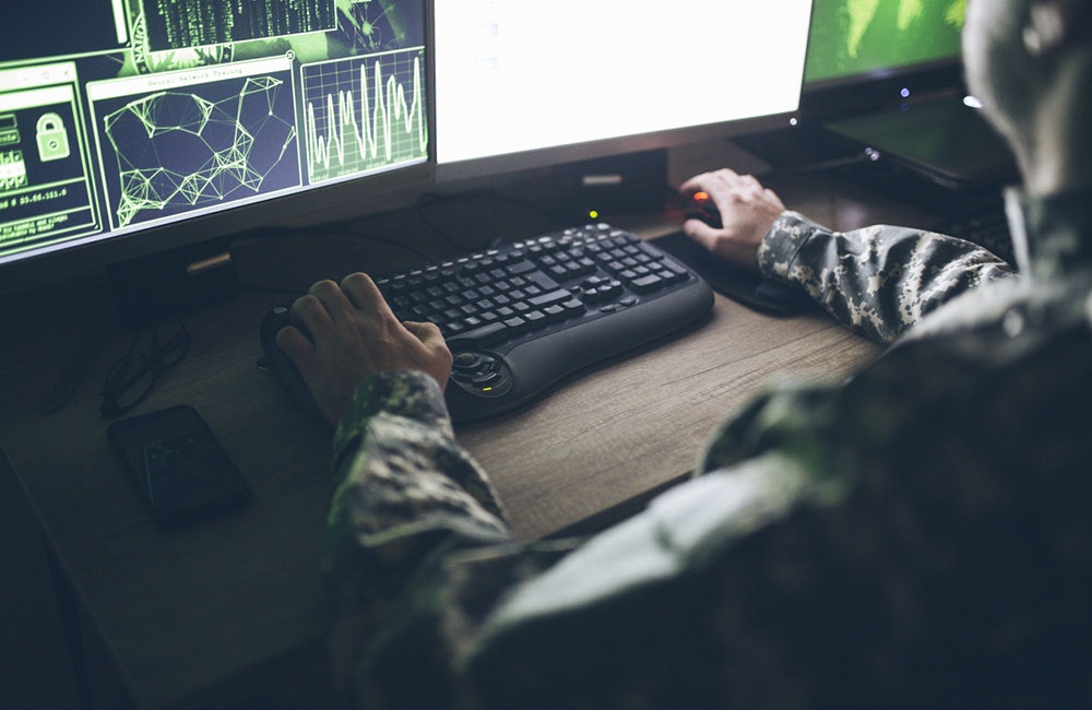 American soldier in headquarter control center