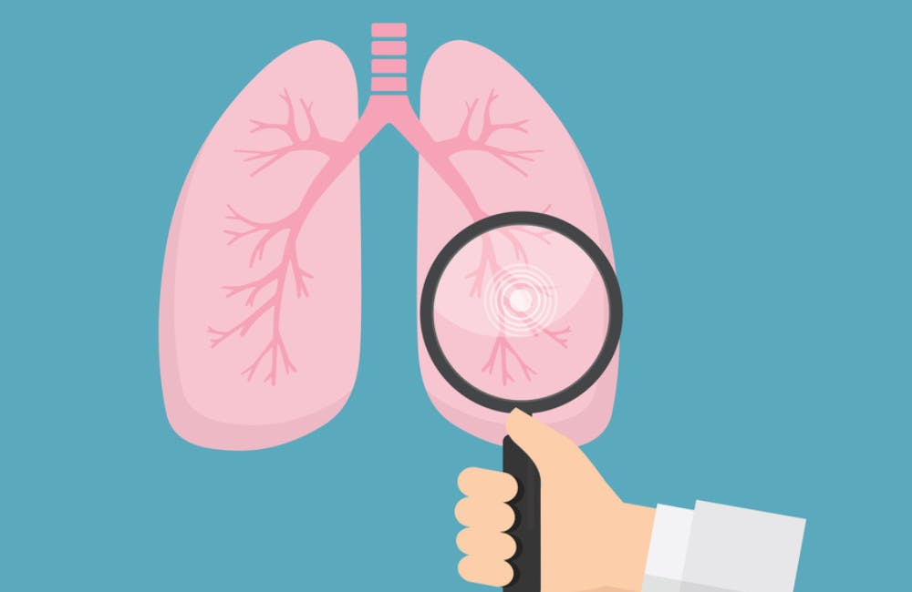 magnifying glass over lungs graphic