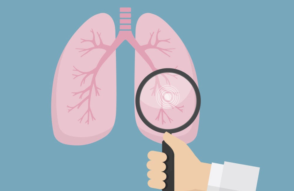 magnifying glass over lungs graphic