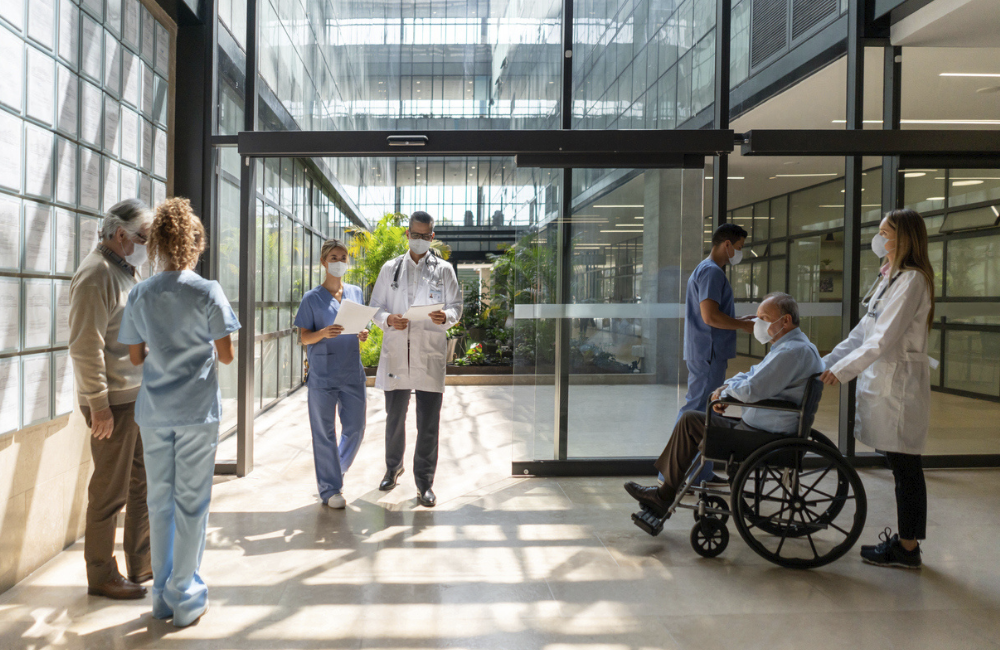 hosptial showing nurses, doctors and patients