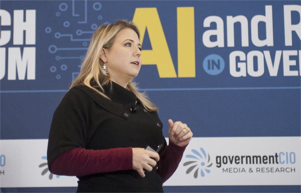 Meredith Clinton, innovation storyteller and engagement manager for Blue Prism, outlines Blue Prism's work with government agencies on robotic process automation.. (Rod Lamkey Jr./GovernmentCIO Media & Research)