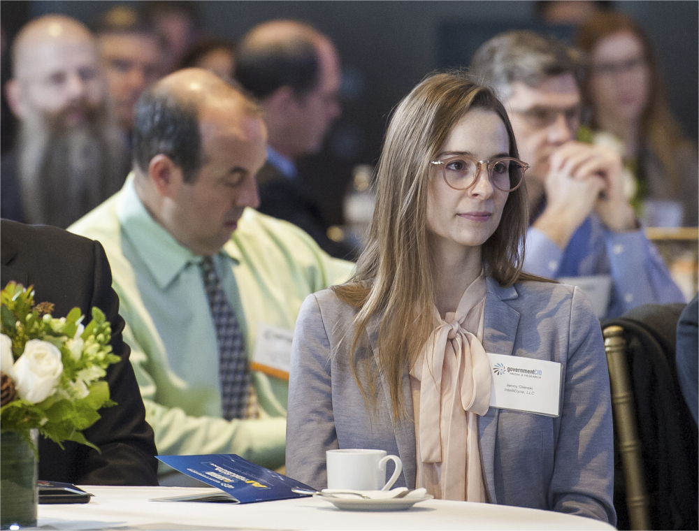 The audience of government and industry technology executives listen to panelists discuss AI initiatives. (Rod Lamkey Jr./GovernmentCIO Media & Research)