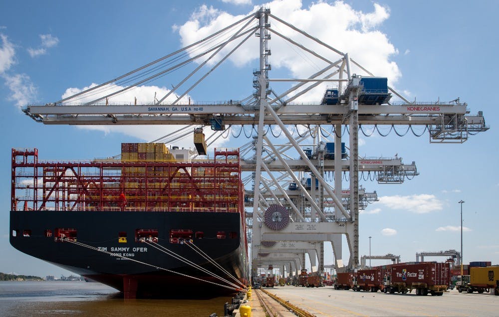 Containers are lifted off a container ship by quay cranes at the Port of Savannah in 2023.
