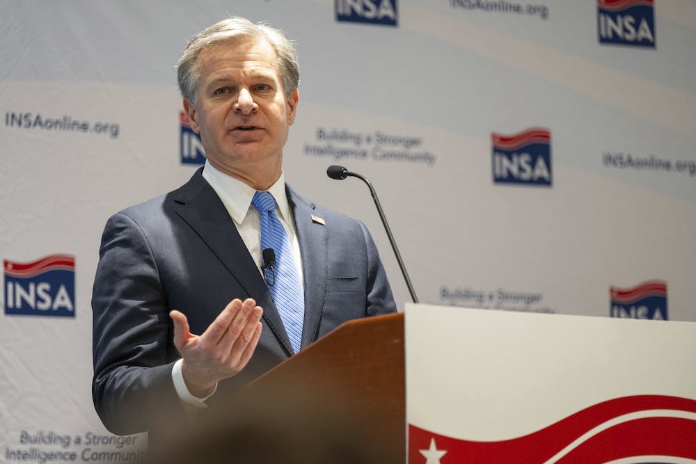 FBI Director Christopher Wray discussed intelligence sharing at the Intelligence and National Security Alliance summit on February 29 in McLean, Virginia.