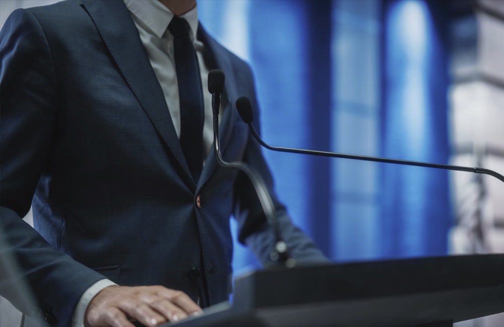 Federal Employee at Podium
