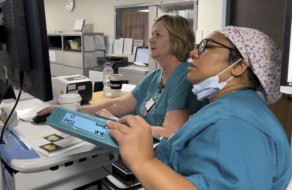 Staff at Landstuhl Regional Medical Center, Germany, input Army electronic medical records in 2023.