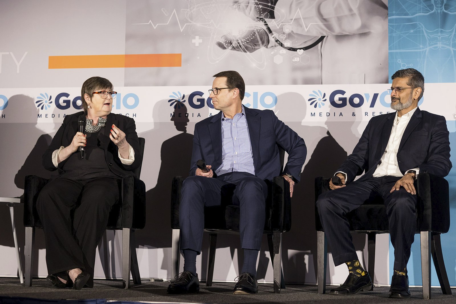 Wendy Nilsen, Rich Persigner and Anuj Kapadia speak during the 2024 Health IT Summit.