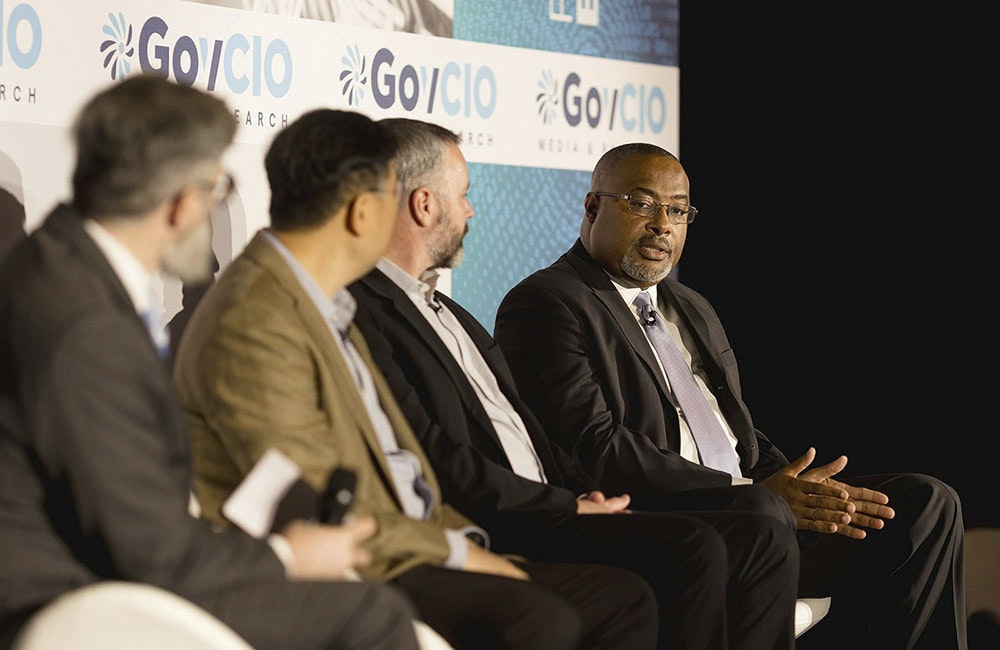 Tyson Brooks, technical director at the National Security Agency’s Artificial Intelligence Security Center, speaks at the GovCIO Media & Research AI Summit in Tysons, Va. on Nov. 7.