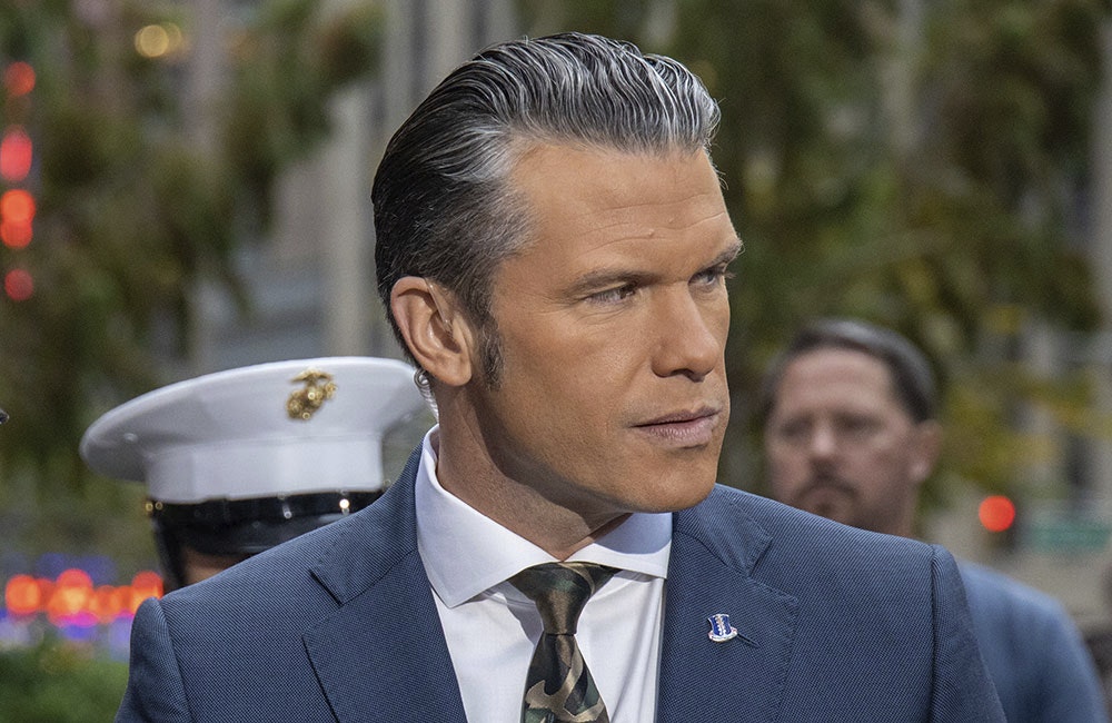 Pete Hegseth conducts a cake-cutting ceremony with Marines during a Fox and Friends morning broadcast in New York in 2023.