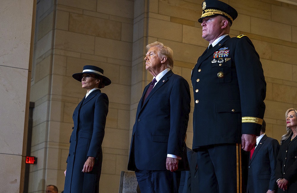 President Donald Trump, first lady Melania Trump and U.S. Army Maj. Gen. Trevor J. Bredenkamp, commanding general of Joint Task Force-National Capital Region, stand in Emancipation Hall during ceremony as part of the 60th Presidential Inauguration in Washington, D.C., Jan. 20, 2025