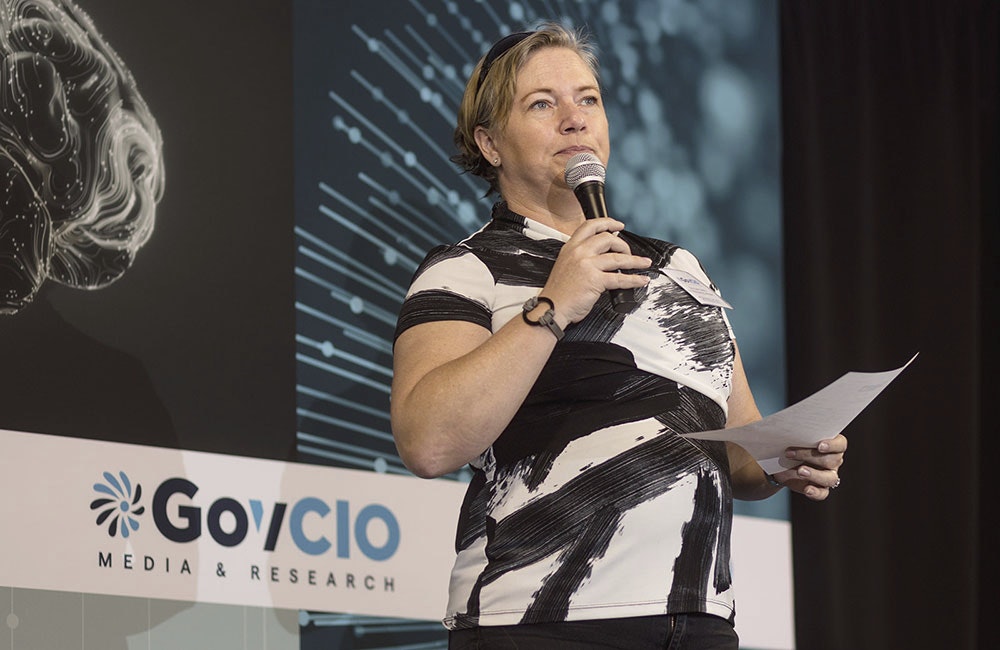 Innovation Directorate Army Recruiting Command's Col. Kris Saling speaks at AI FedLab in Reston, Virginia, June 12, 2024.