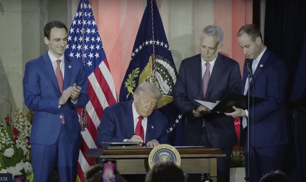President Donald Trump signs three new executive orders on July 23, 2025, to bolster the nation's AI infrastructure.