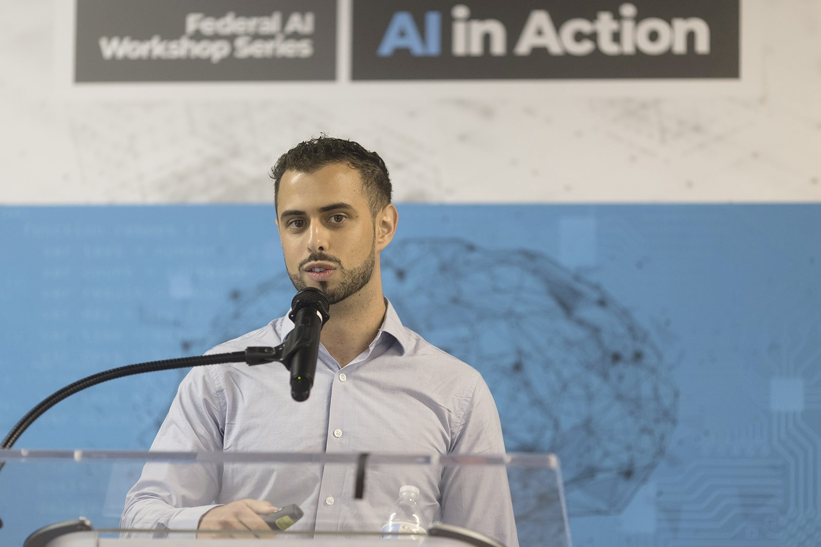 Glenn Parham, CEO at GovBench, speaks at the AI in Action Workshop