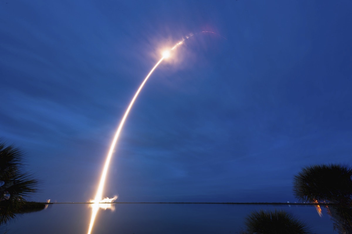 Satellite launch over water